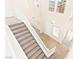 Staircase featuring neutral carpet, tile floor and bright natural light at 2755 Asgard Ave, Las Vegas, NV 89121