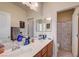 Bathroom with double sinks and a shower tub combo at 2856 Trossachs St, Henderson, NV 89044