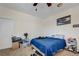 This bedroom has carpeted floors and a ceiling fan for added comfort at 2856 Trossachs St, Henderson, NV 89044
