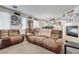 Inviting living room featuring a fireplace and cozy seating for relaxing and entertaining at 2856 Trossachs St, Henderson, NV 89044