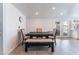 Bright dining area featuring modern table set, light-colored flooring, and natural light at 2990 Carnelian St, Las Vegas, NV 89121