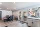 Bright dining area offering outdoor access through French doors with a full view of the backyard patio at 2990 Carnelian St, Las Vegas, NV 89121