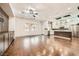 Expansive living area showcasing hardwood floors, great lighting, and seamless kitchen access at 3198 Stella Cilento Ave, Henderson, NV 89044