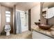 Bathroom with double vessel sinks, granite counters, mosaic tile backsplash, and shower-tub combination at 3471 Cape Cod Dr, Las Vegas, NV 89122