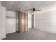 Bedroom with carpet, ceiling fan, built-in storage cabinets, and closets with shelving at 3471 Cape Cod Dr, Las Vegas, NV 89122