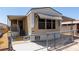 Attractive home featuring a fenced yard and covered porch with steps at 3471 Cape Cod Dr, Las Vegas, NV 89122