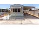 Front exterior view of a well-kept home with a covered parking area at 3471 Cape Cod Dr, Las Vegas, NV 89122
