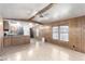 Inviting open-concept living room, offering hardwood-style flooring and windows for natural light at 3471 Cape Cod Dr, Las Vegas, NV 89122