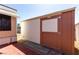 Backyard storage shed with a single access door, placed on a brick patio at 3471 Cape Cod Dr, Las Vegas, NV 89122