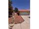 Ranch-style home with driveway, desert landscaping, tile roof and mailbox at 3644 Valley Dr, North Las Vegas, NV 89032