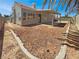 Spacious backyard with patio and desert landscaping at 3804 Wren Ct, North Las Vegas, NV 89032