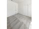 Minimalist bedroom with carpet, closet, and white walls at 3804 Wren Ct, North Las Vegas, NV 89032
