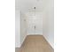 Bright entryway with tiled flooring, white walls, and a modern pendant light fixture at 3804 Wren Ct, North Las Vegas, NV 89032