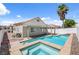Backyard oasis with a private pool, spa, and covered patio ideal for Gathering fun and entertaining at 406 River Glider Ave, North Las Vegas, NV 89084