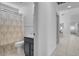 Bathroom with neutral colors, vanity with storage, and a shower at 406 River Glider Ave, North Las Vegas, NV 89084