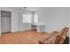 Spacious bedroom with closet, desk, and cozy sofa for relaxation at 406 River Glider Ave, North Las Vegas, NV 89084