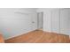Well-lit bedroom with ample closet space and convenient access to the bathroom at 406 River Glider Ave, North Las Vegas, NV 89084