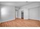 Bright and spacious bedroom with wood-look flooring and closet space at 406 River Glider Ave, North Las Vegas, NV 89084