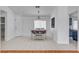 Dining area features tile floors and natural light from a window at 406 River Glider Ave, North Las Vegas, NV 89084