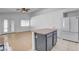 Well-designed kitchen with an island, modern appliances, and an open concept at 406 River Glider Ave, North Las Vegas, NV 89084