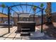 Backyard featuring a hot tub, swing and desert landscaping perfect for outdoor relaxation at 4129 Ridgewood Ave, Las Vegas, NV 89120