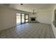 Living room boasts a fireplace and sliding glass doors with access to the yard at 4200 Via Vaquero Ave, Las Vegas, NV 89102
