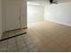 The living room features tile flooring, white walls, and a ceiling fan at 4200 Via Vaquero Ave, Las Vegas, NV 89102