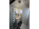 Bathroom featuring a tiled shower and vanity at 4567 S Nellis Blvd, Las Vegas, NV 89121