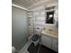 Bathroom featuring a tiled shower and vanity at 4567 S Nellis Blvd, Las Vegas, NV 89121