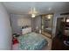 Bedroom with carpet, natural light, and ample closet space at 4567 S Nellis Blvd, Las Vegas, NV 89121