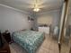 Bedroom with tile floors, natural light, and ample closet space at 4567 S Nellis Blvd, Las Vegas, NV 89121