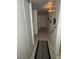 A hallway with tile flooring and garland hung on the wall at 4567 S Nellis Blvd, Las Vegas, NV 89121