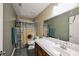 Bathroom with single sink vanity, decorative shower curtain, and standard toilet at 47 Desert Sunflower Cir, Henderson, NV 89002