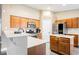 Well-equipped kitchen with stainless steel appliances, quartz countertops, and custom cabinetry at 47 Desert Sunflower Cir, Henderson, NV 89002