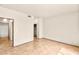 Bright bedroom featuring neutral walls, closet access, and tile flooring for a clean aesthetic at 4830 Grey Wolf Ln # 104, Las Vegas, NV 89149