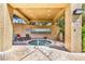 Community hot tub area with covered seating area and no smoking sign at 5123 Southern Hills Ln, Las Vegas, NV 89113