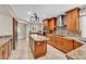 Modern kitchen featuring stainless steel appliances and a center island with granite countertops at 5123 Southern Hills Ln, Las Vegas, NV 89113