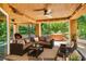 Staged outdoor living space features a cozy seating area and inviting hot tub at 5123 Southern Hills Ln, Las Vegas, NV 89113