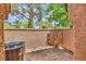 Cozy, brick-paved patio area showcasing AC unit and privacy walls at 5123 Southern Hills Ln, Las Vegas, NV 89113