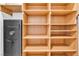 Large walk-in closet with custom shelving, lighting, and a hidden safe for secure storage at 5123 Southern Hills Ln, Las Vegas, NV 89113