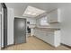 Bright kitchen featuring stainless steel appliances and white cabinets at 538 Kristin Ln, Henderson, NV 89011