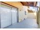 Enclosed patio with sliding glass doors and a textured concrete surface, offering a private outdoor space at 538 Kristin Ln, Henderson, NV 89011