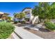 Inviting condo exterior with landscaped grounds and a private balcony at 5650 E Sahara Ave # 1001, Las Vegas, NV 89142