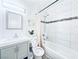Bright bathroom with a shower over tub and modern vanity at 5821 Marka Dr, Las Vegas, NV 89108