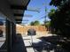 Private backyard with mature landscaping and patio area, perfect for outdoor entertaining at 6409 Burgundy Way, Las Vegas, NV 89107