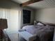 Relaxing bedroom with plush bedding and sliding glass doors for natural light and fresh air at 6409 Burgundy Way, Las Vegas, NV 89107