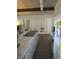 Efficient galley kitchen with stainless steel appliances and lots of counter space at 6409 Burgundy Way, Las Vegas, NV 89107