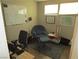 Inviting home office features a comfortable lounge chair, modern decor, and ample natural light at 6409 Burgundy Way, Las Vegas, NV 89107
