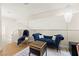 Bonus room with stylish chaise lounge, area rug, and pendant lighting at 68 Belle Soleil Ave, Las Vegas, NV 89123