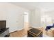 Bright hallway featuring wood floors, white trim, and recessed lighting at 68 Belle Soleil Ave, Las Vegas, NV 89123
